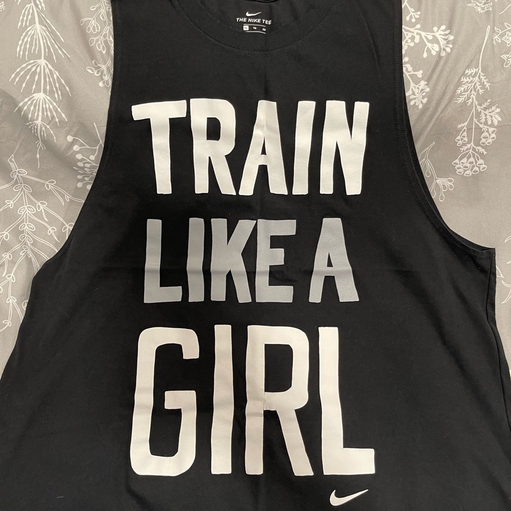 2 Nike muscle tanks